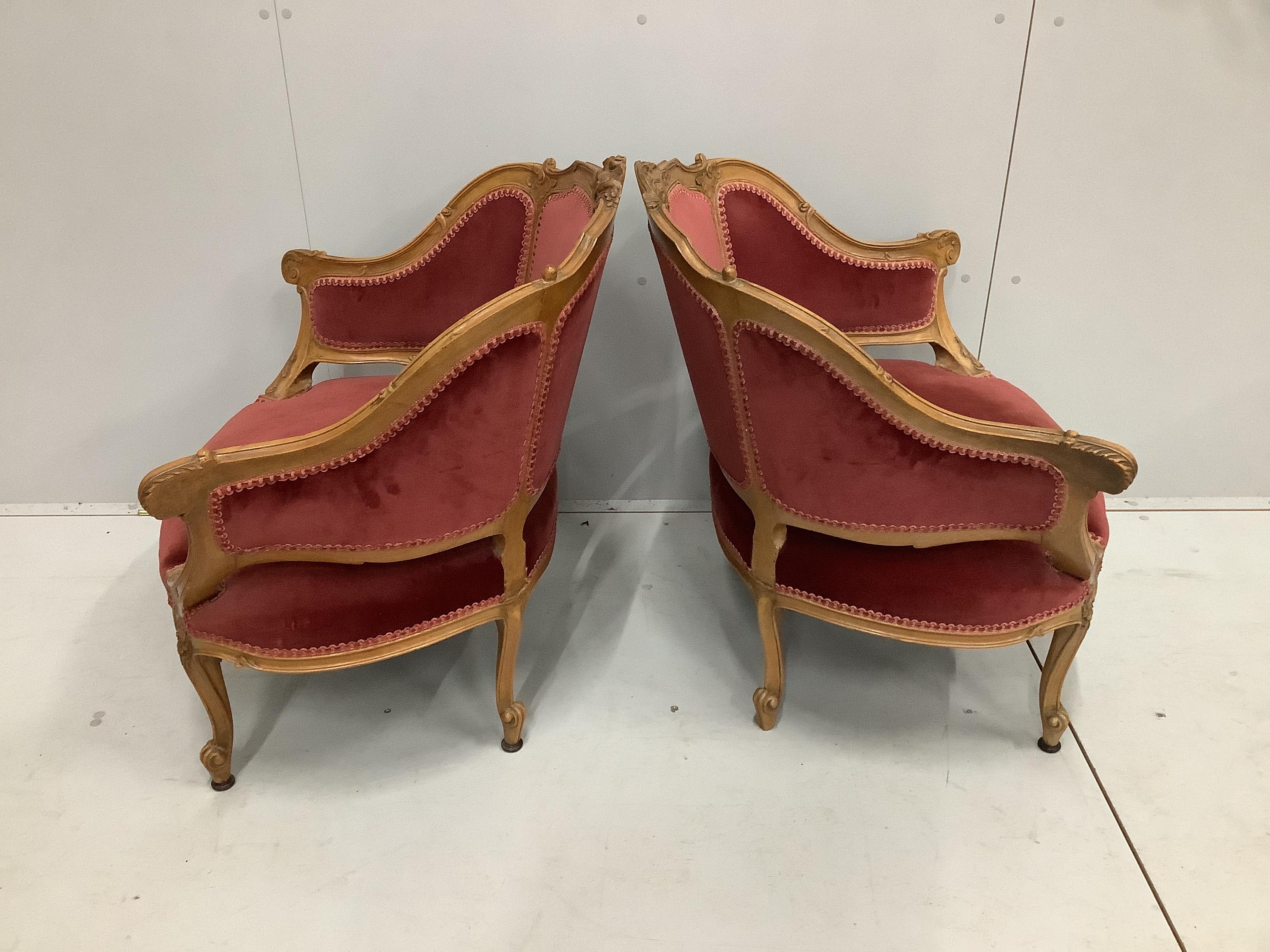 A pair of late 19th / early 20th century French carved beech fauteuils, width 80cm, depth 62cm, height 79cm